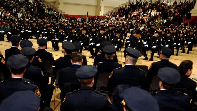 A new class of Suffolk police officers graduate.