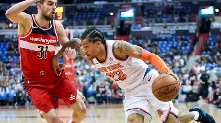 New York Knicks guard Trey Burke (23) drives