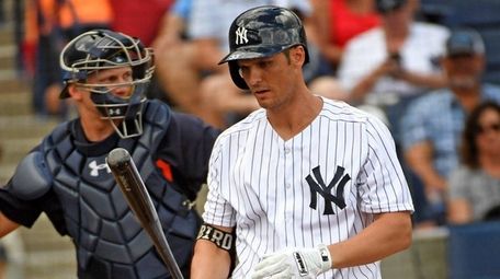 Yankees first baseman Greg Bird walks back to