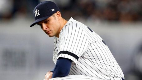 Yankees first baseman Greg Bird looks on during