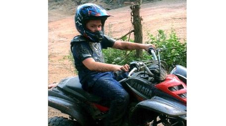 Michael Mennette enjoys driving his ATV.