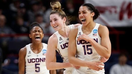 Connecticut's Crystal Dangerfield (5) and Katie Lou Samuelson