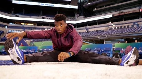 Penn State running back Saquon Barkley stretches at