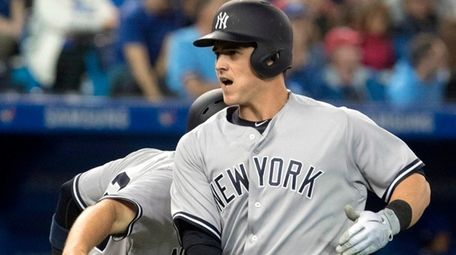 Tyler Austin crosses plate on his two-run