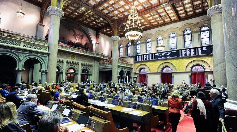 Members of the State Assembly consider budget bills