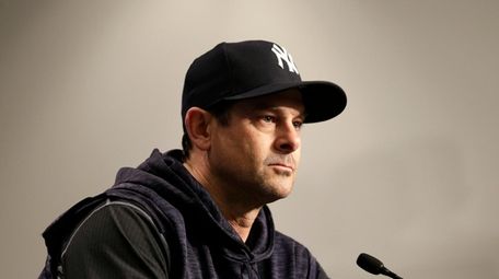 Yankees manager Aaron Boone speaks to reporters before