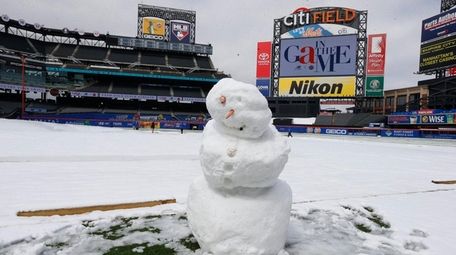 A snowman was built on the field after
