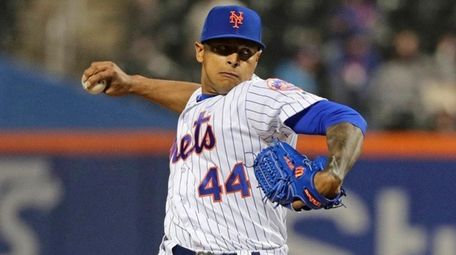 The Mets' AJ Ramos delivers a pitch during
