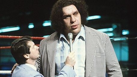 Andre The Giant, right, is interviewed by Vince
