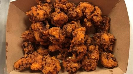 Hearty nuggets of fried alligator are among the