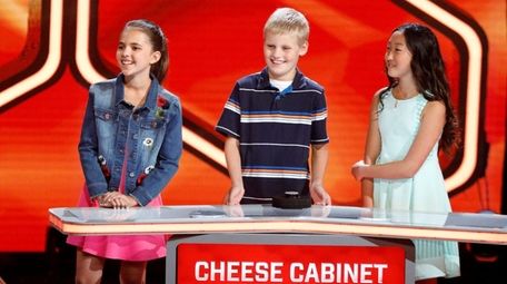 Norah Petrozak (far right), a 12-year-old from Merrick,
