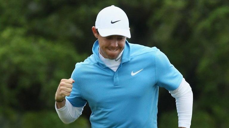 Rory McIlroy reacts to a putt on the