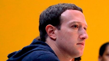 Facebook CEO Mark Zuckerberg meets with a group