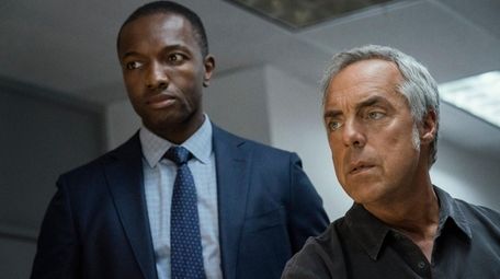 Jamie Hector, left, and Titus Welliver star in