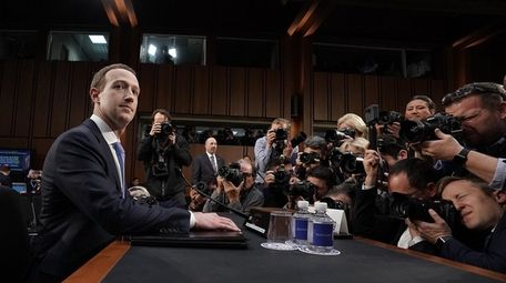 Facebook CEO Mark Zuckerberg waits to testify in