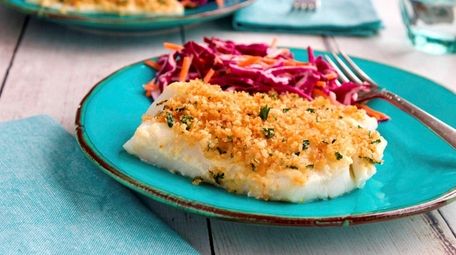 A mustard-mayonnaise blend is spread on the cod,