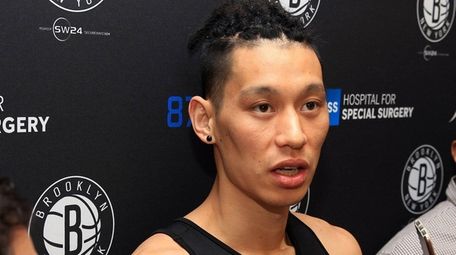The Nets' Jeremy Lin talks to the media