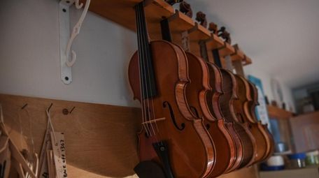 Violins on a rack in the Dix Hills