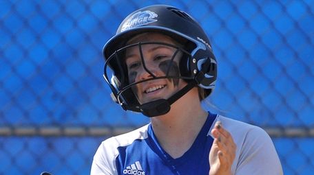 Heather Berberich, Calhoun shortstop, reacts after crossing home