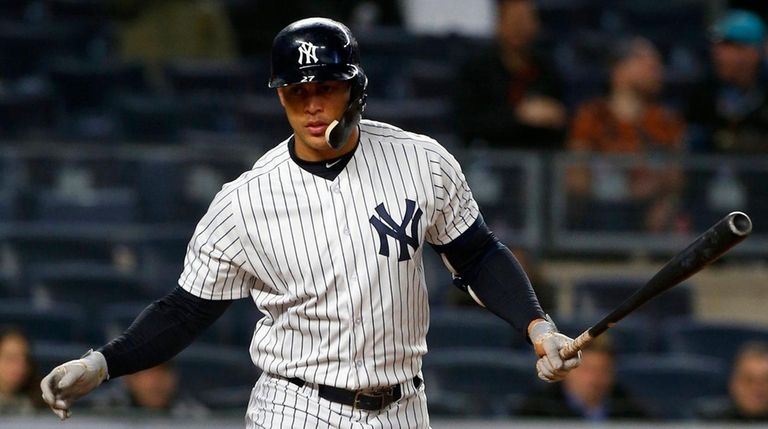 Giancarlo Stanton of the Yankees strikes out in