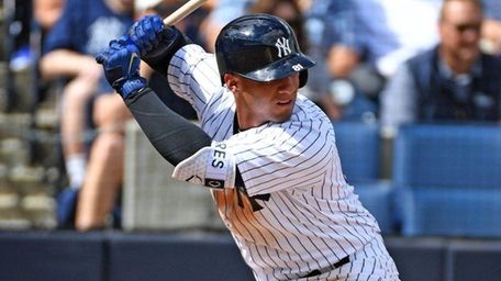 The Yankees' Gleyber Torres bats during a spring
