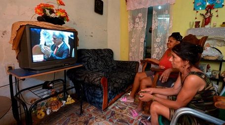 Cubans watch on TV as Miguel Mario
