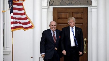 Rudy Giuliani with then-President-elect Donald Trump on Nov.