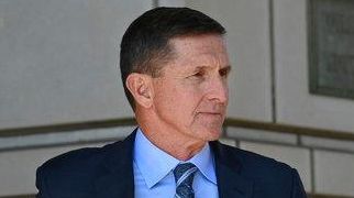 Former Trump national security adviser Michael Flynn leaves