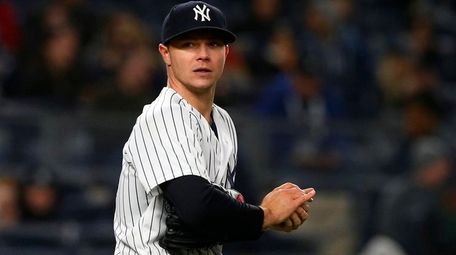 Sonny Gray of the Yankees looks on during