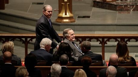 Former Presidents George W. Bush and George H.W.