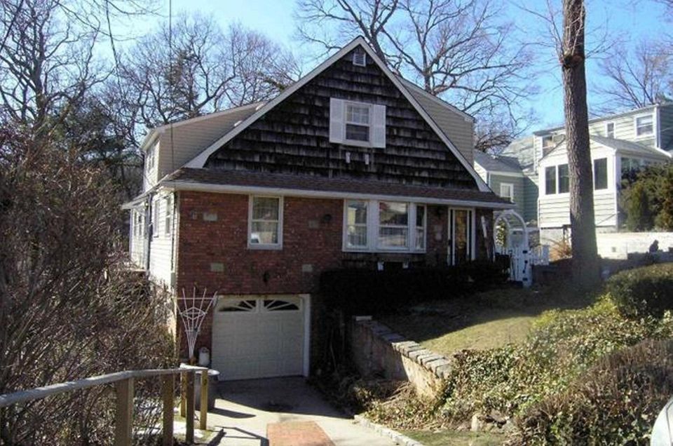 This Bayville Cape includes six bedrooms and 2
