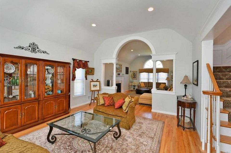 Beyond the two-story entry in this South Huntington