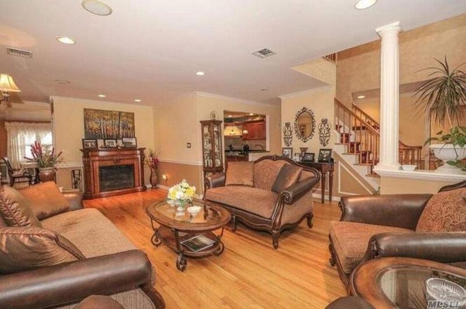 The living room in this Malverne Colonial leads