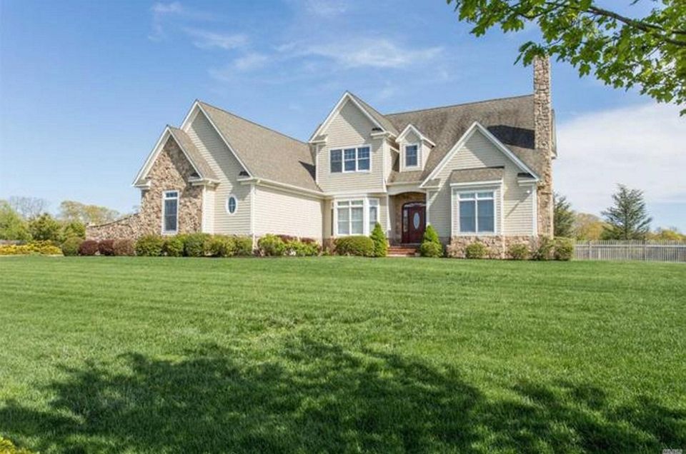 This Laurel Colonial includes five bedrooms and 3