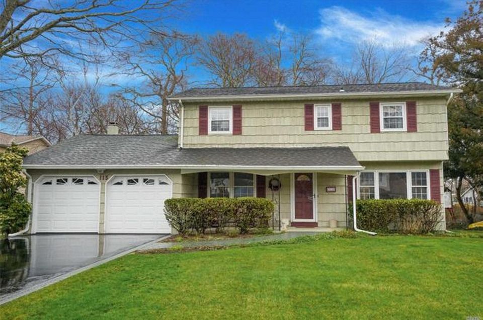 This Oakdale Colonial includes four bedrooms and 2