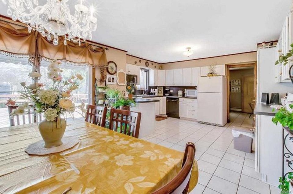 The eat-in kitchen in this Nesconset farm ranch