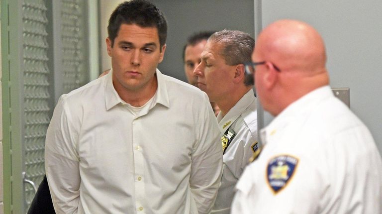 Christopher Bouchard, inside Judge Camacho's courtroom at First