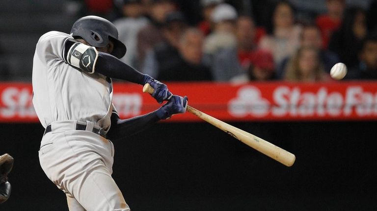 The Yankees' Didi Gregorius hits a home run