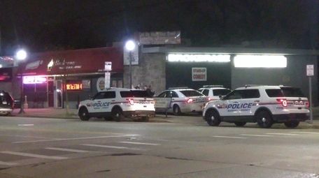 Nassau County police respond to a call Friday