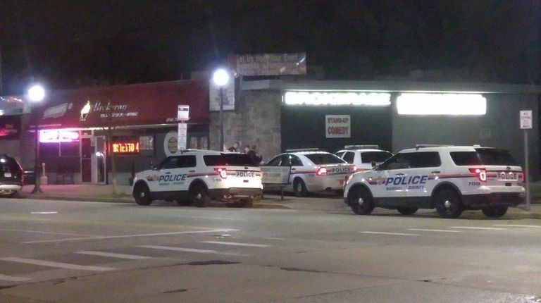 Nassau County police respond to a call Friday