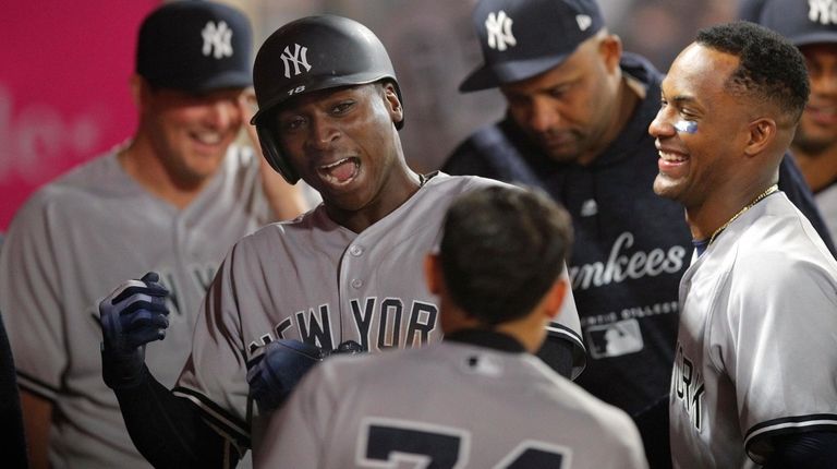 The Yankees' Didi Gregorius, second from left, celebrates