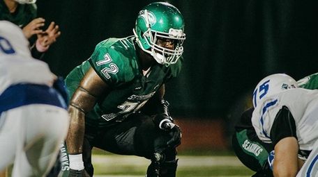 Elmont's Greg Senat was an offensive lineman at