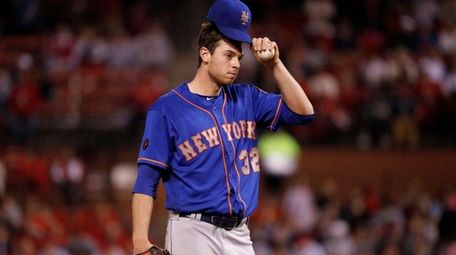 New York Mets starting pitcher Steven Matz waits