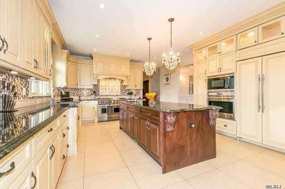 The gourmet eat-in kitchen in this Roslyn Heights