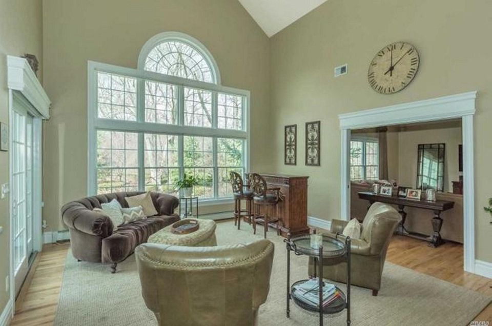 The two-story great room in this Northport Colonial