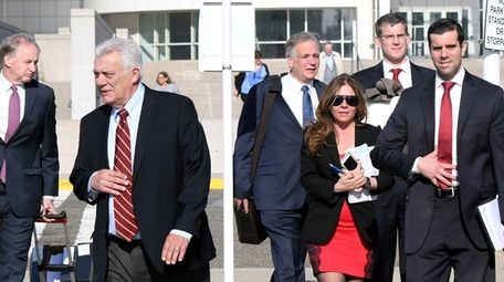 John Venditto, left, and Edward Mangano leave the