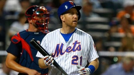 Todd Frazierof the Mets strikes out against the