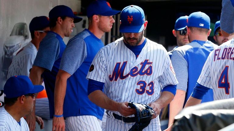 Matt Harvey of the Mets walks through the
