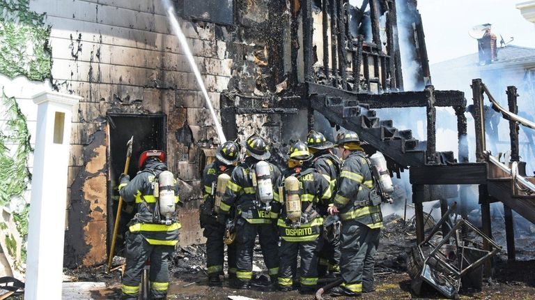 Volunteer firefighters from the Brentwood Fire Department work