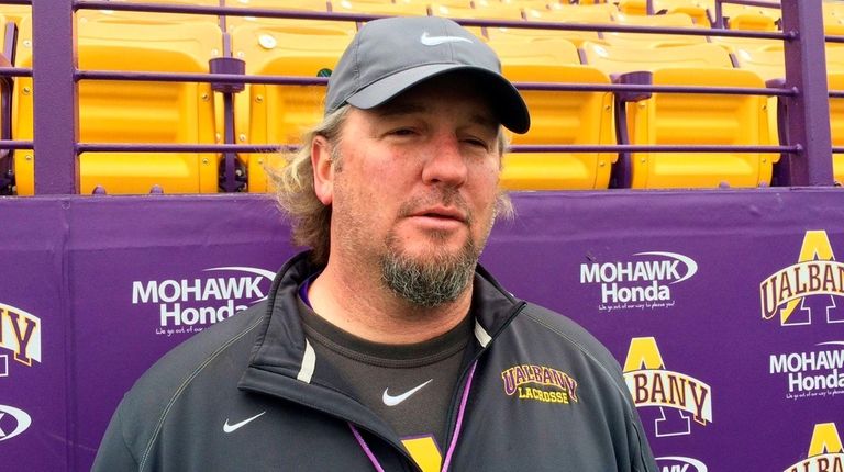 Albany men's lacrosse coach Scott Marr talks to